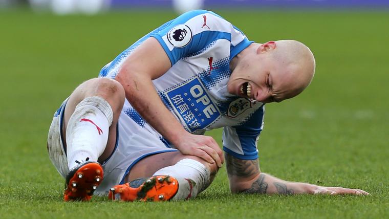 Mooy stretchered off with knee injury image