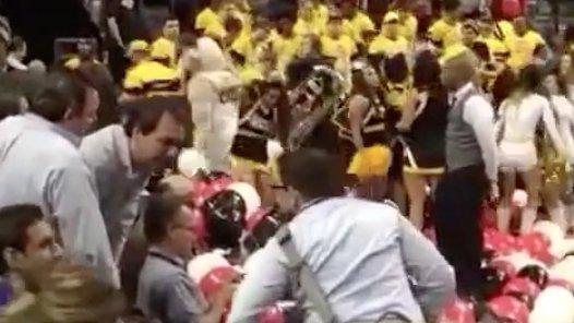 Video: Angry cheerleader struggles to pop balloon image