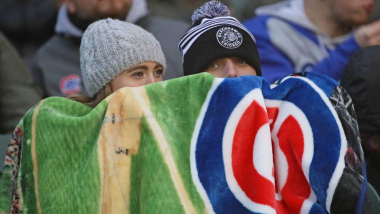 In cold, heat or rain, baseball fans find deeper connection at the ballpark image