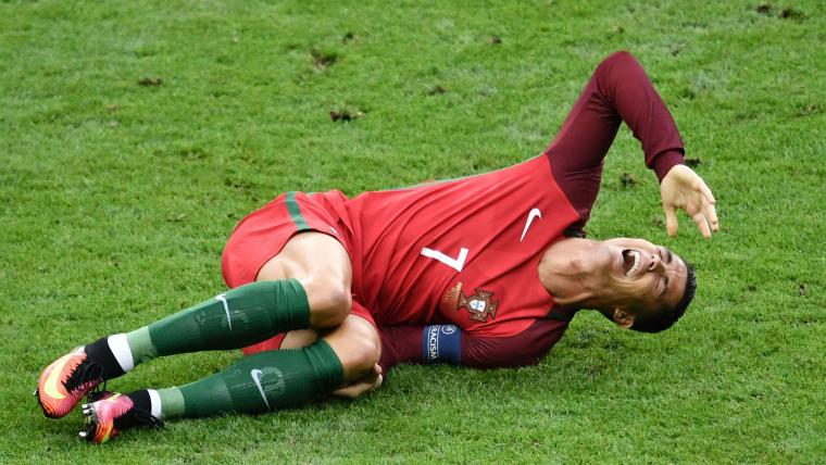 Injured Ronaldo in tears after being forced off in Euro 2016 final image