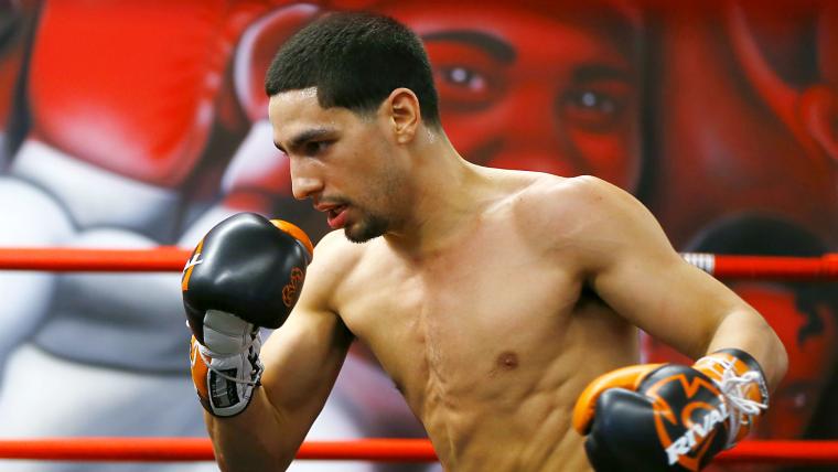 Danny Garcia fires on all cyclinders, scoring a seventh-round knockout over Adrian Granados image