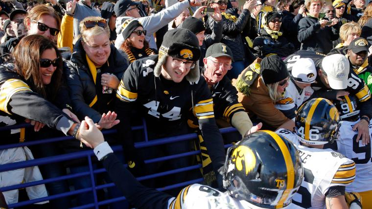 Iowa fans throw trash onto field after penalty calls vs. Northwestern image