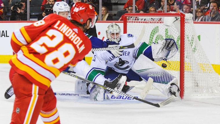 Resilient Flames rally past Canucks: Takeaways from Saturday's rematch image