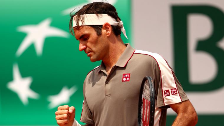 Federer ousts Wawrinka, Nadal next image