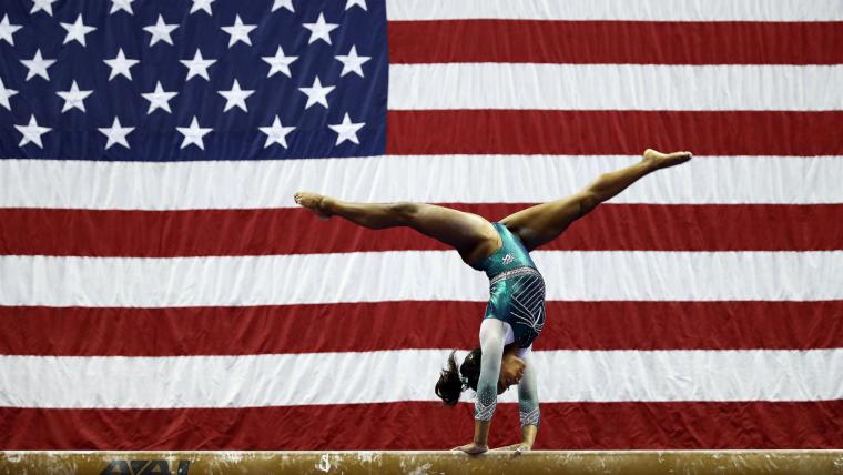 Simone Biles makes history with beam dismount image