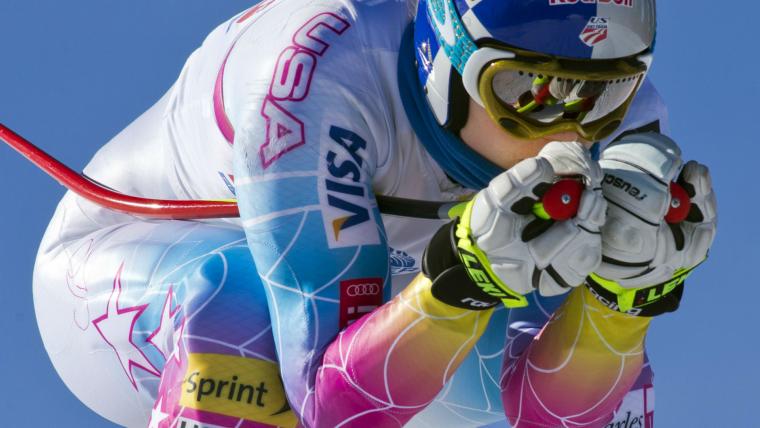 What happens when a spectator runs onto a ski course during a heat? image