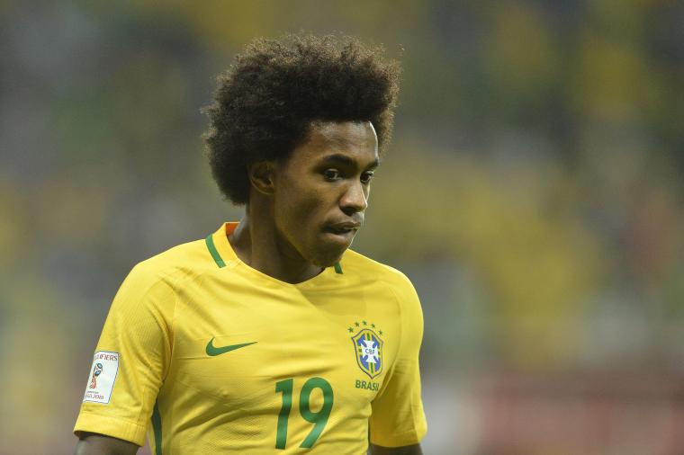 Willian embracing Coutinho battle image