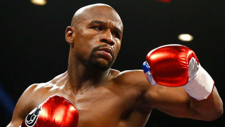 How old is Floyd Mayweather? Age, bio, record entering 2023 boxing fight vs. Aaron Chalmers image