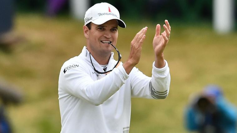 Johnson fends off Oosthuizen, Leishman, wins British Open in playoff image