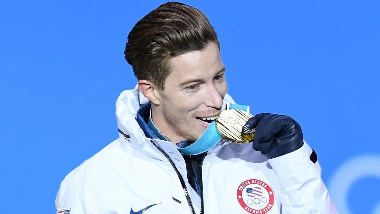 Why do Olympic athletes bite their medals? image