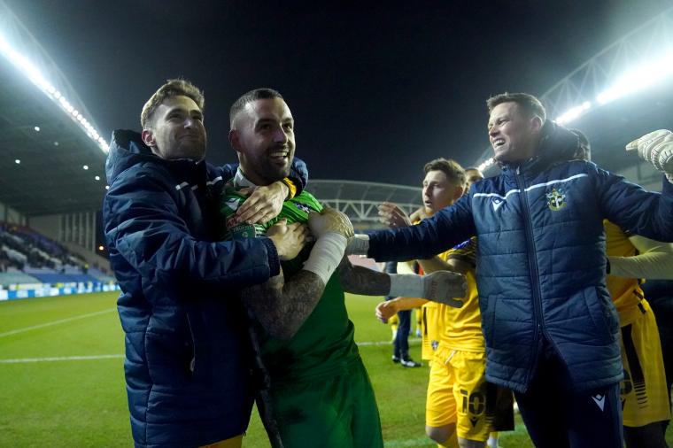 Aussie keeper's penalty shoot-out heroics secure club's spot at Wembley image