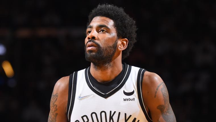 Nets' Kyrie Irving shows out in front of teammates in New Jersey image