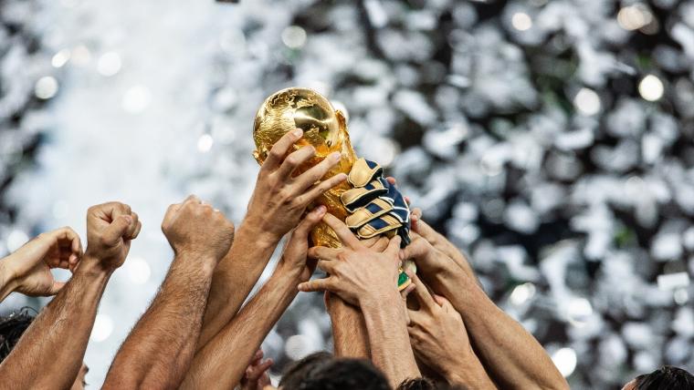 Who is allowed to touch the World Cup trophy? image