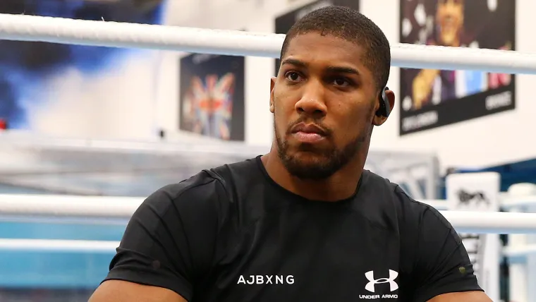 Anthony Joshua denies Eddie Hearn's claim he's relieved to no longer be champ image