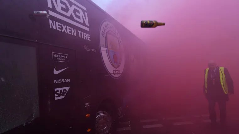 Guardiola questions police after Man City bus attacked by Liverpool fans image
