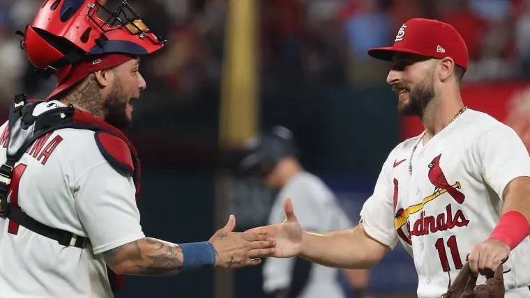 Yadier Molina and Paul DeJong