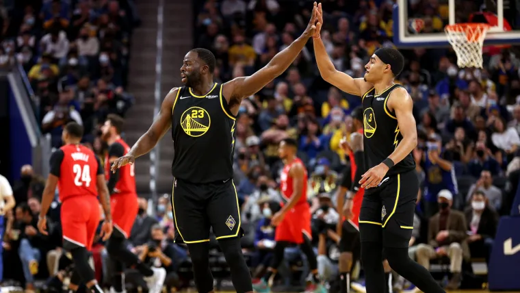 Draymond Green (left) and Jordan Poole (right)