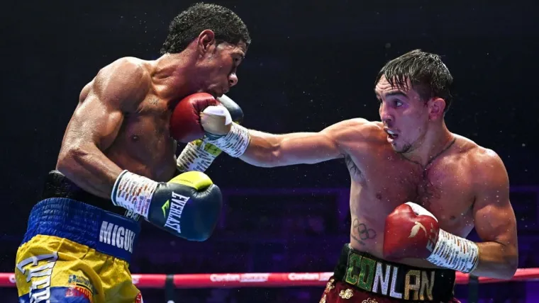 Michael Conlan (right) against Colombian veteran Miguel Marriaga