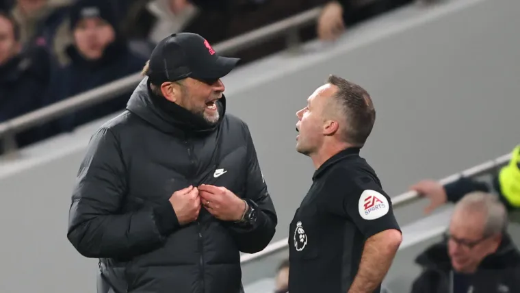 Jurgen Klopp of Liverpool and Paul Tierney referee Premier League