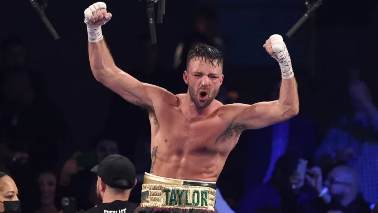 Josh Taylor celebrates winning undisputed championship