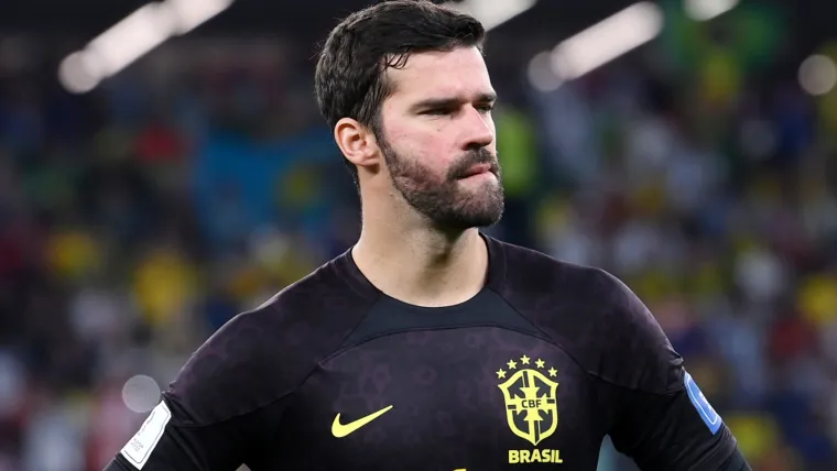 Alisson wears Brazil black goalkeeper kit during 2022 FIFA World Cup