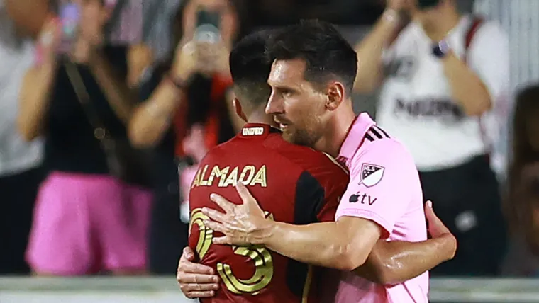 Lionel Messi of Inter Miami and Thiago Almada of Atlanta United