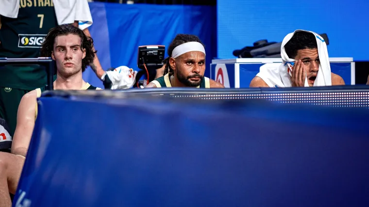 Josh Giddey, Patty Mills, Josh Green watch on at the FIBA World Cup.