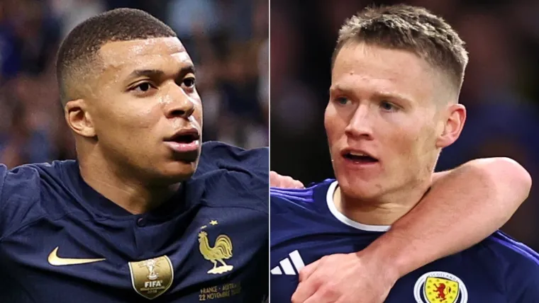 France striker Kylian Mbappe and Scotland midfielder Scott McTominay playing football