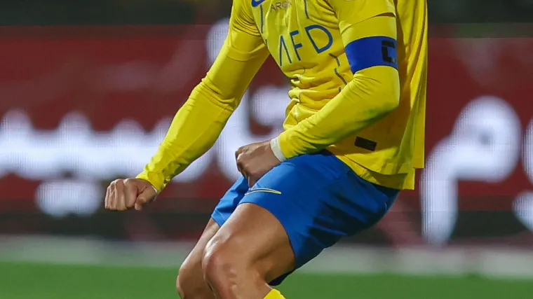 Cristiano Ronaldo gestures to Al Shabab fans after an Al Nassr match