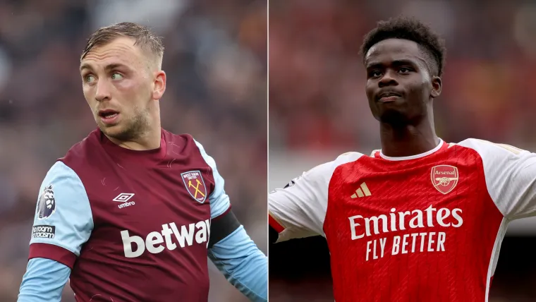 Jarrod Bowen of West Ham and Bukayo Saka of Arsenal split