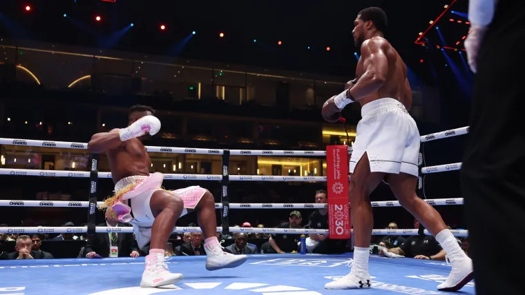 Francis Ngannou is KO'd by Anthony Joshua