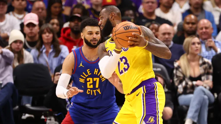 Jamal Murray guards LeBron James