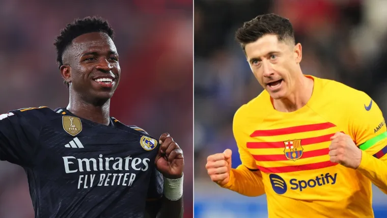 Vinicius Jr of Real Madrid and Robert Lewandowski of Barcelona split