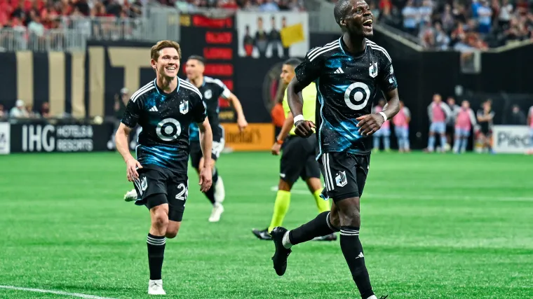 Minnesota United forward Tani Oluwaseyi celebrates scoring a goal