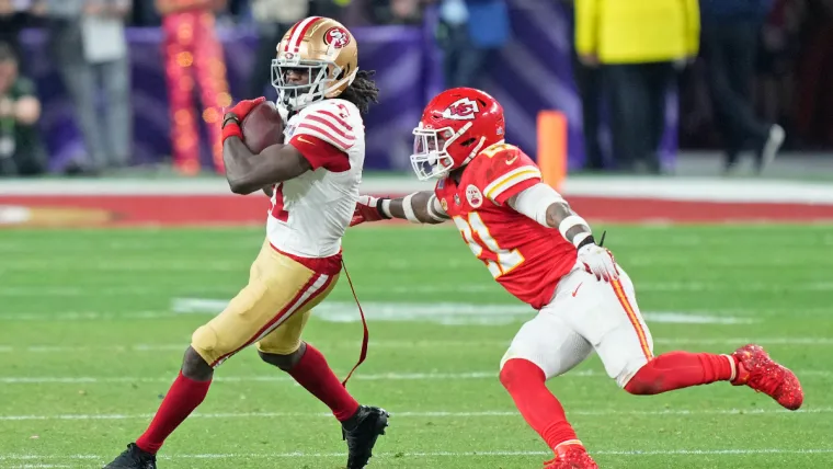 Feb 11, 2024; Paradise, Nevada, USA; San Francisco 49ers wide receiver Brandon Aiyuk (11) makes a catch against Kansas City Chiefs safety Mike Edwards (21) during overtime of Super Bowl LVIII at Allegiant Stadium. Mandatory Credit: Kyle Terada-USA TODAY Sports