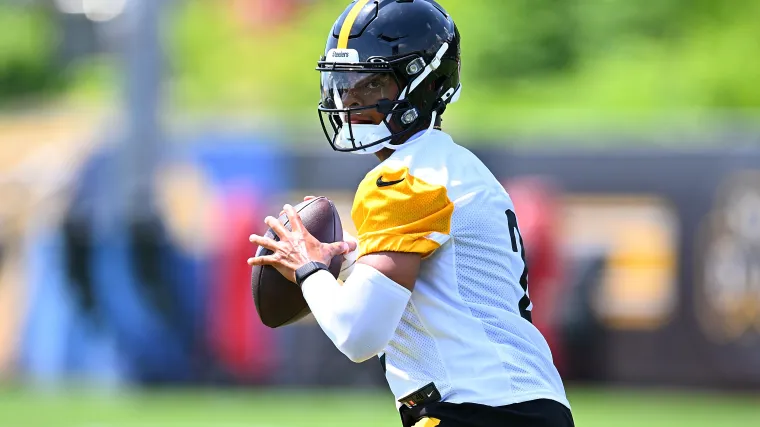 Justin Fields steps back to throw during Steelers minicamp.