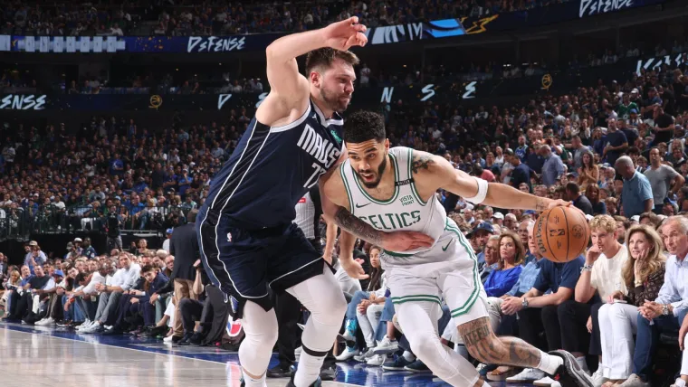 Luka Doncic guards Jayson Tatum