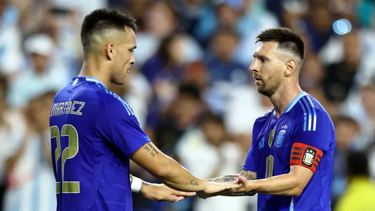 Lautaro Martinez and Lionel Messi of Argentina