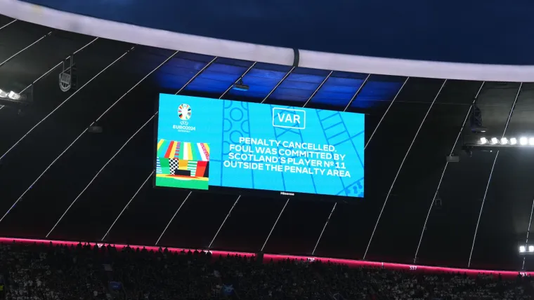 The stadium screen explains a VAR decision during Germany's Euro 2024 match with Scotland