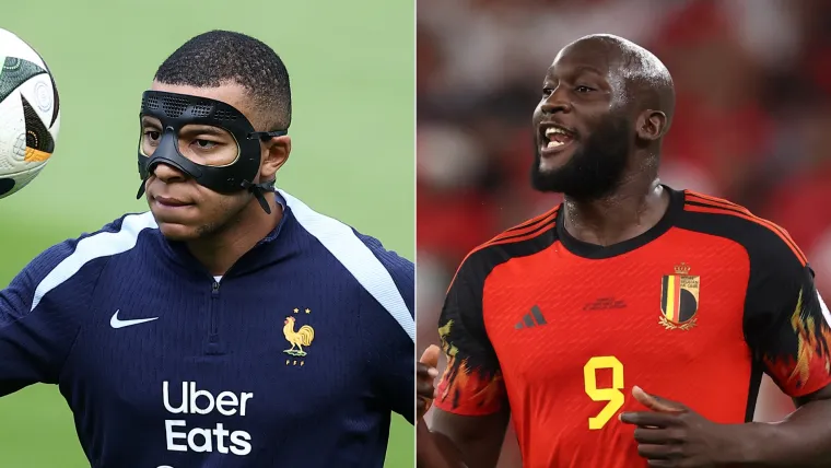 Kylian Mbappe of France and Romelu Lukaku of Belgium split