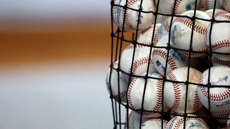 Jul 2, 2024; Miami, Florida, USA; A bucket of baseball sits on the field before the game between the Boston Red Sox and the Miami Marlins at loanDepot Park. Mandatory Credit: Rhona Wise-USA TODAY Sports