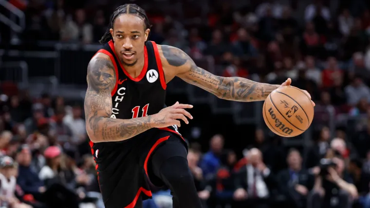 Apr 1, 2024; Chicago, Illinois, USA; Chicago Bulls forward DeMar DeRozan (11) brings the ball up court against the Atlanta Hawks during the first half at United Center. Mandatory Credit: Kamil Krzaczynski-USA TODAY Sports