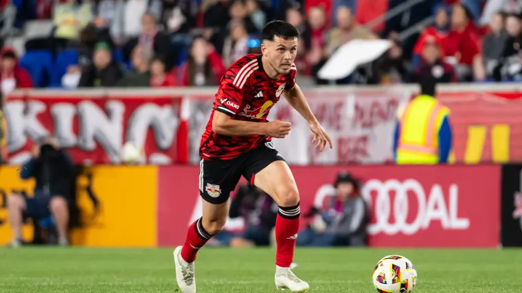 New York Red Bulls striker Lewis Morgan dribbles during a match