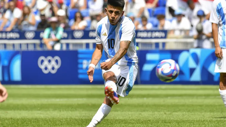 Argentina midfielder Thiago Almada takes a shot. 