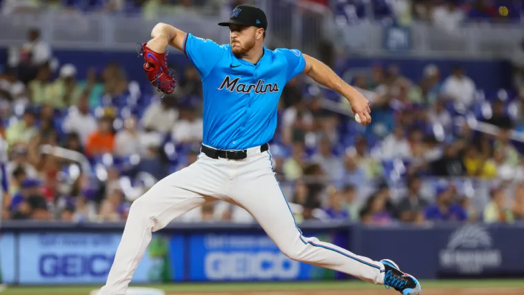 Jul 21, 2024; Miami, Florida, USA; Miami Marlins starting pitcher Trevor Rogers (28) delivers a pitch against the New York Mets during the first inning at loanDepot Park. Mandatory Credit: Sam Navarro-USA TODAY Sports