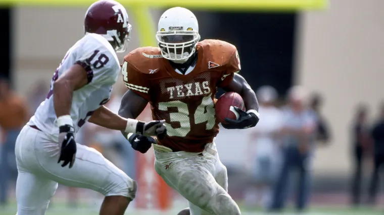 Texas running back Ricky Williams carries the ball against Texas A&M