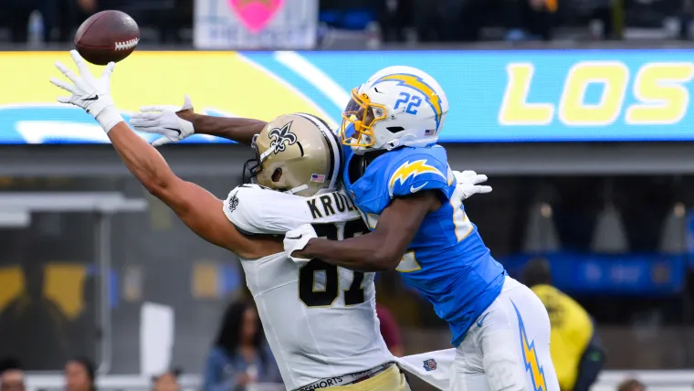 Chargers safety JT Woods (22) against New Orleans Saints tight end Lucas Krull (87)