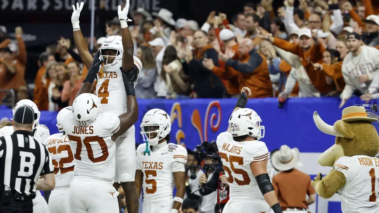 Texas running back CJ Baxter celebrates a touchdown