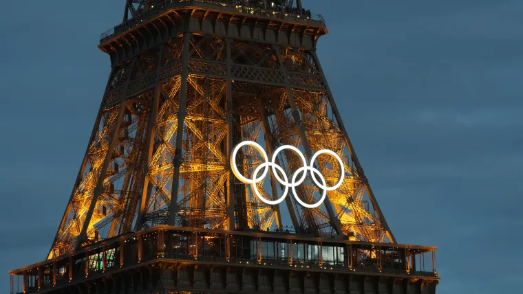 Olympic rings adorn the Eiffel Tower in advance of the 2024 Paris Olympic Games.