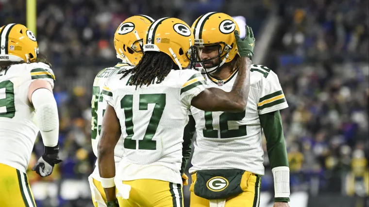 Davante Adams and Aaron Rodgers interact on field